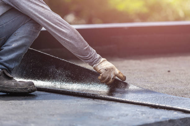 Professional Basement Waterproofing technician working in Pine Village, IN